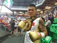 Vietnamese boxer knocks out Thai challenger to retain WBA Asia title