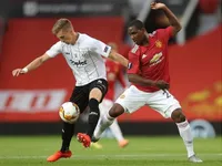 Below-strength Man United move into Europa League last eight