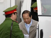 Former communications ministers stand trial for bribery