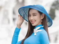 Thùy Tiên diện áo dài sau đăng quang Miss Grand International 2021