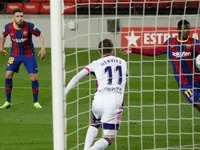 Dembele volley takes Barca one point behind Atletico