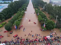 Thêm nhiều người thiệt mạng do mưa lũ, Trung Quốc nâng mức cảnh báo