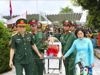 Remains of martyrs repatriated from Laos reburied in Dien Bien