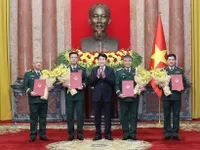 Senior military, public security officers promoted to higher ranks