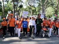 More than 5,000 people join charity walk for AO victims