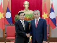 Party General Secretary hosts top Lao leader