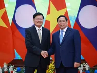 Prime Minister welcomes Lao Party General Secretary and President in Hanoi