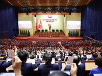 14th National Party Congress adopts Resolution