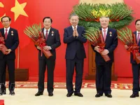 Party chief presents elite honours to incumbent, former leaders