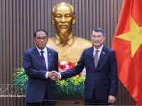 PM Le Minh Hung receives Malaysian Minister of Defence Mohamed Khaled bin Nordin