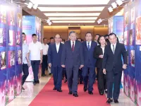 Party, State leaders visit exhibition honouring exemplary people