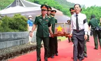 Reburial held in Thanh Hoa for remains of martyrs repatriated from Laos