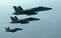 Mỹ không kích 12 mục tiêu của IS ở Syria
