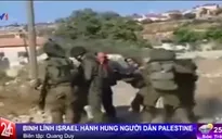 Binh lính Israel hành hung thường dân Palestine