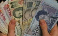 Đồng bolivar mất giá, kinh tế Venezuela cận kề siêu lạm phát