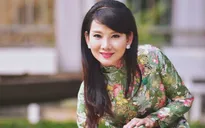 Mỹ Uyên thướt tha áo dài đón Tết