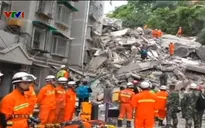 Chung cư 9 tầng ở Trung Quốc bất ngờ đổ sập