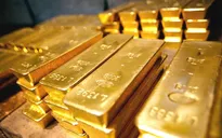 Vàng rời khỏi mức thấp trong 6 năm sau quyết định của FED