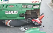 Xe buýt mất phanh cuốn cô gái vào gầm