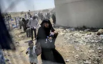 Gần 1 triệu người mắc kẹt trong các vùng chiến sự Syria