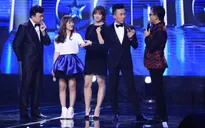 Hari Won miễn cưỡng nhìn tình địch nắm tay Trấn Thành