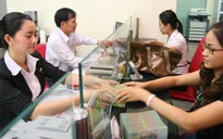 Thanh khoản ngân hàng dư thừa kéo lãi suất giảm