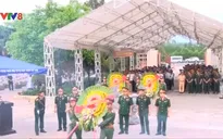An táng hài cốt liệt sĩ quân tình nguyện và chuyên gia Việt Nam hy sinh tại Lào