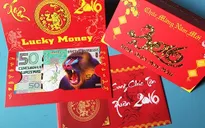 Tiền lì xì hình khỉ “đắt khách” dịp Tết Bính Thân 2016