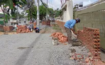 TP.HCM tạm dừng thi công nâng cao đường Kinh Dương Vương