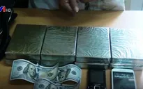 Bắt đối tượng vận chuyển 8 bánh heroin qua biên giới
