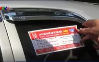 Hà Nội dán đề can cho gần 20.000 taxi để tuyên truyền luật