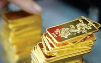 Giá vàng tiếp tục giảm, tỷ giá trung tâm tăng