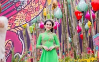 Lâm Khánh Chi duyên dáng mặc áo dài đón Tết
