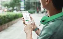 Grab hợp tác với Vietcombank thanh toán không tiền mặt