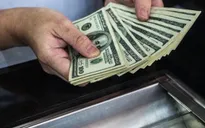 Đồng USD sụt giảm theo đà tăng của chứng khoán