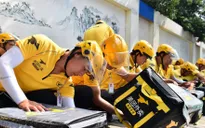 Cuộc cạnh tranh khốc liệt trên thị trường giao đồ ăn trực tuyến tại Trung Quốc