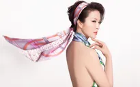 Quấn khăn làm áo, MC Thanh Mai khoe vẻ đẹp nóng bỏng ở tuổi 46