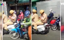 TP.HCM: Cảnh sát giao thông đưa em bé bị ngất đi cấp cứu