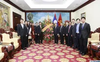 Thứ trưởng Ngoại giao Nguyễn Minh Vũ chúc mừng Quốc khánh CHDCND Lào