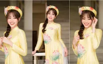 Á hậu Phương Nga khác lạ với tóc tết, áo dài