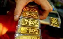 Tỷ giá trung tâm tăng, giá vàng giảm mạnh