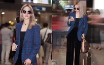 Nam Em diện đồ kín như bưng vẫn gây chú ý tại sân bay