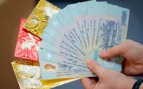 Cha mẹ lấy tiền lì xì của con có bị phạt 1 triệu đồng?