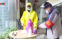 Các tình nguyện viên Trung Quốc nỗ lực hỗ trợ đối phó dịch viêm phổi cấp