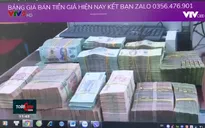 Báo động tình trạng mua bán tiền giả công khai