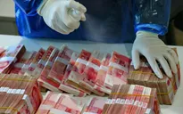 Trung Quốc khử trùng tiền cũ và ngoại tệ