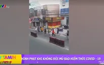 Vitamin chống COVID-19: Ngộ nghĩnh bé mặc đồ du hành vũ trụ ngừa COVID-19