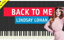 Lindsay Lohan ăn mặc lộng lẫy để... ngồi nhà quảng bá đĩa đơn mới
