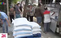 TP.HCM: Người dân góp gạo cho máy phát gạo tự động