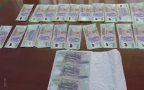 Bắt "tại trận" người phụ nữ mang gần 20 triệu đồng tiền giả đi chợ